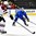 GRAND FORKS, NORTH DAKOTA - APRIL 15: Sweden's Jesper Bratt #12 skates with the puck while Latvia's Sandis Smons #19 defends during preliminary round action at the 2016 IIHF Ice Hockey U18 World Championship. (Photo by Matt Zambonin/HHOF-IIHF Images)

